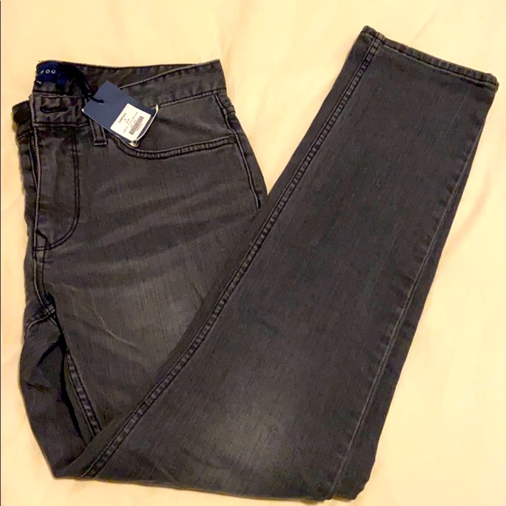 Five four. Dark grey jeans